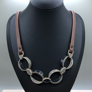 Trendy statement style faux leather necklace.